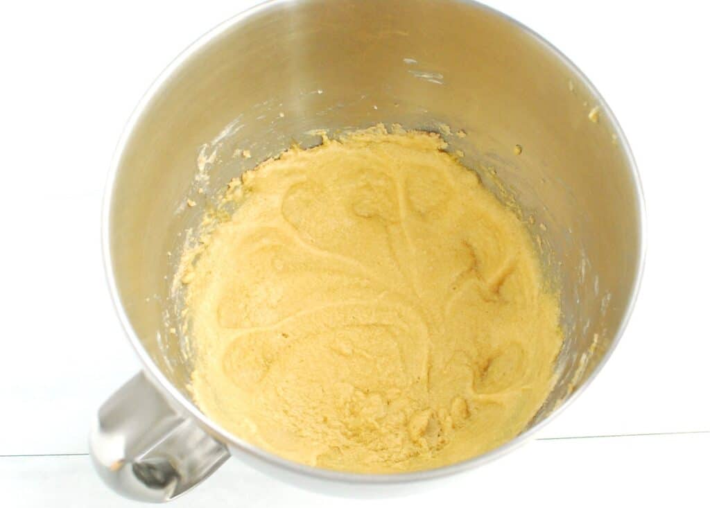 Eggs, honey, and vanilla added to the bowl and mixed with the butter, sugar, and brown sugar.