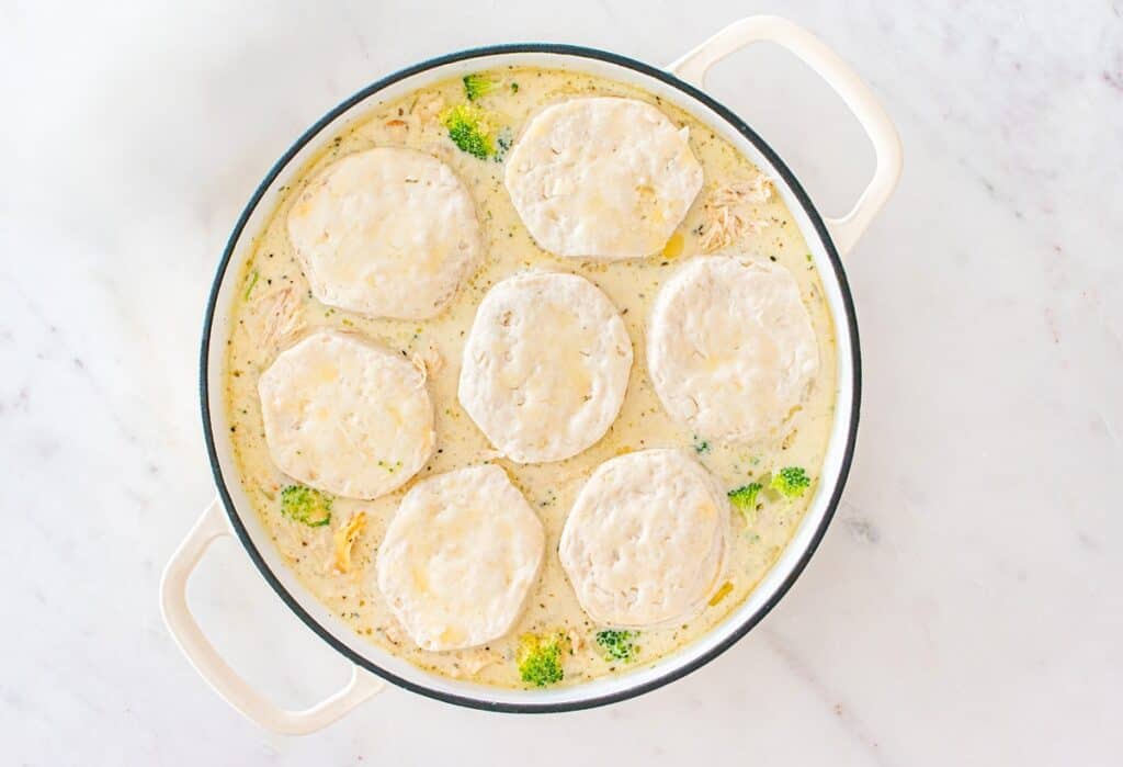 Refrigerated canned biscuits placed on top of the chicken broccoli mixture.