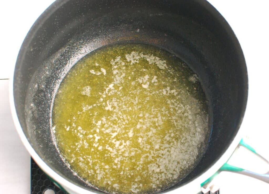 Dairy-free butter heated in a pot until light golden brown.