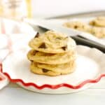 A stack of dairy free miso chocolate chip cookies on a small plate.