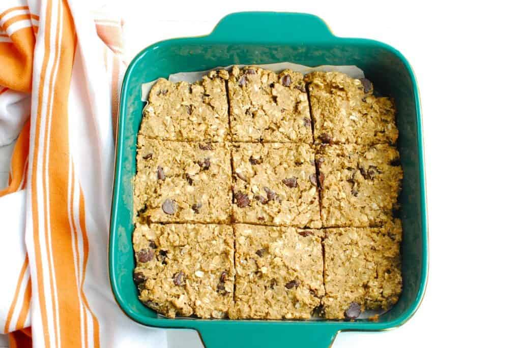 A baking dish with allergen friendly oatmeal chocolate chip bars.