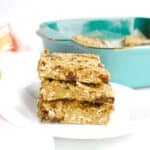A stack of three higher protein allergen friendly oatmeal chocolate chip bars.