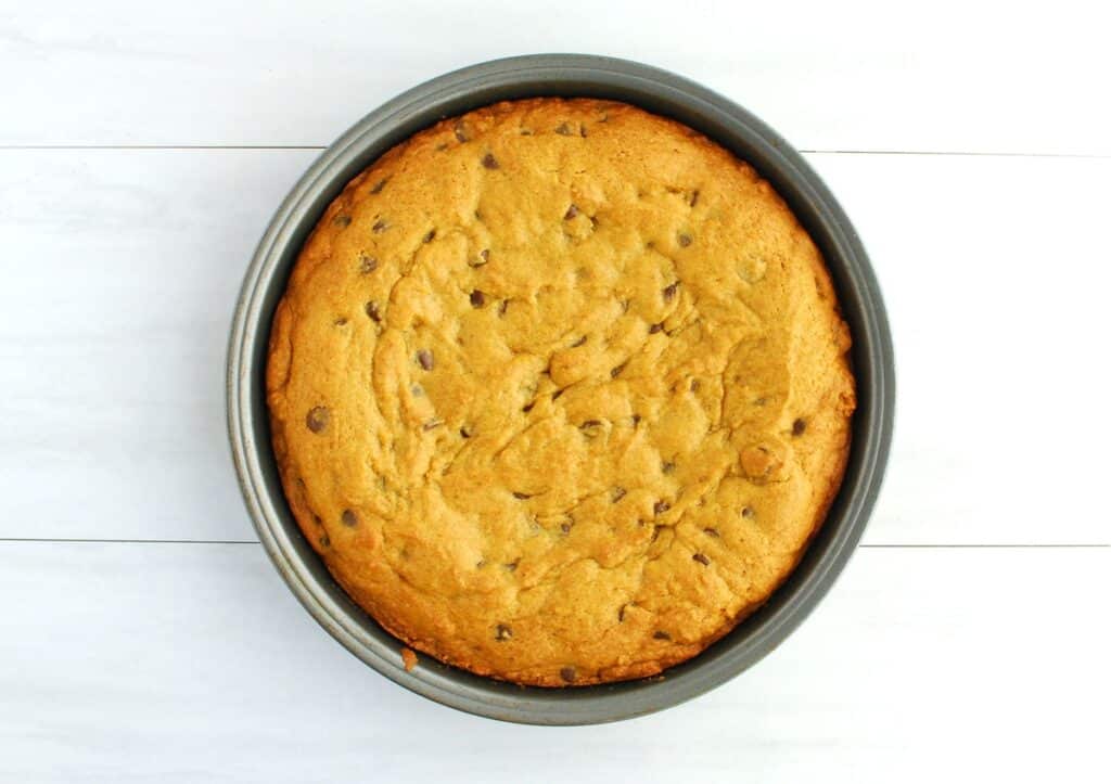 A just-baked pumpkin cookie cake still in the pan.