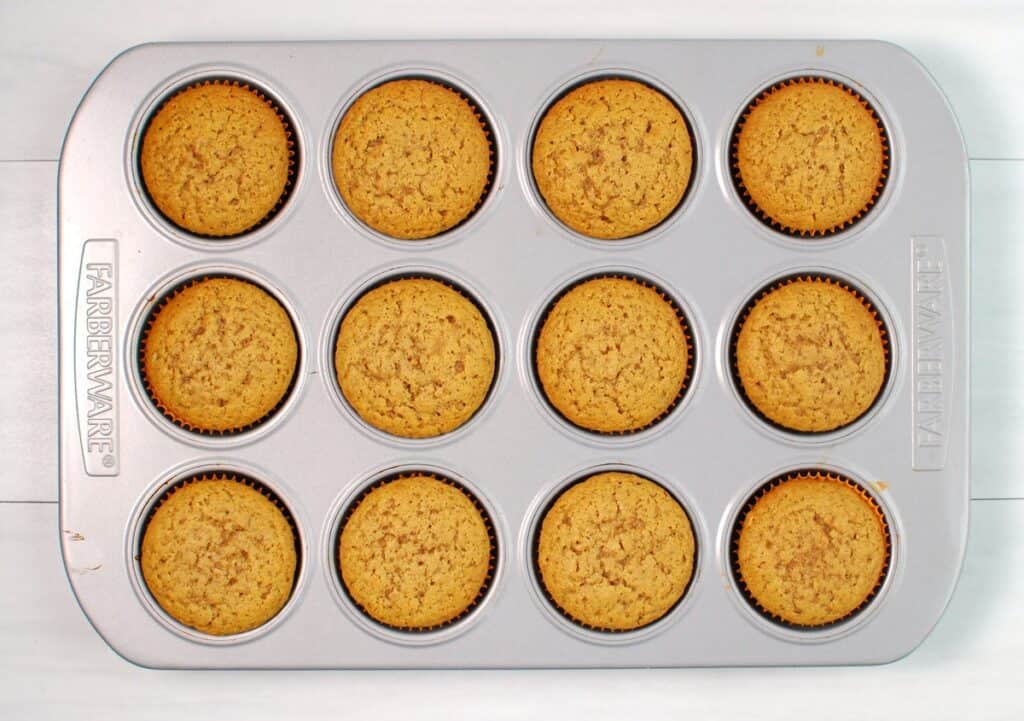 A baking tin filled with sweet potato cupcakes.